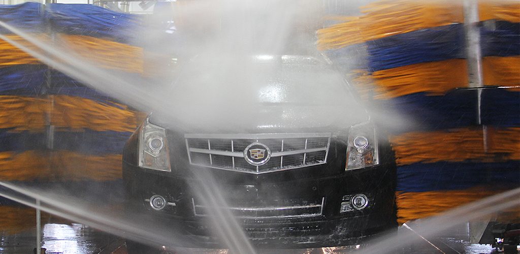 Vehicle going through the tunnel wash